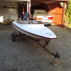 X udkendt med fed lille en