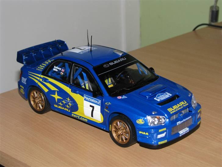 Mine Modelbiler (Flest Ford) - Subaru Impreza WRC som den så ud i Rallye de France 2003 med P.Solberg som chauffør... 1:18 fra Sun Star billede 46