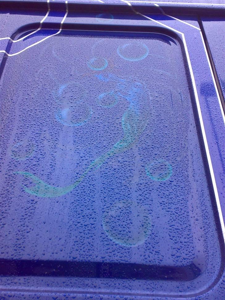 Min vogn ved H C Svendsen.  - Motivet på højre side af 43'eren billede 62