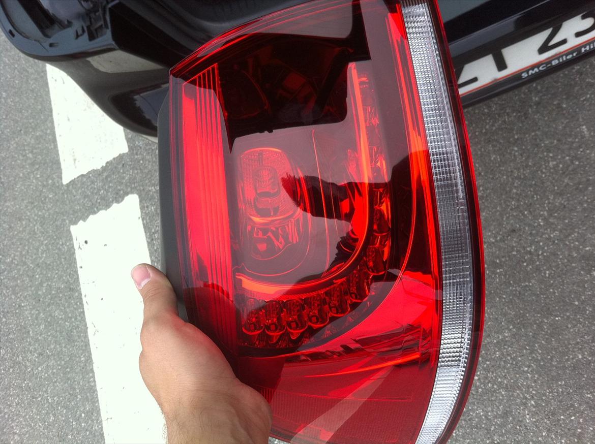 udskiftning af baglygter vw golf 6. - Den nye lygte sættes på billede 20