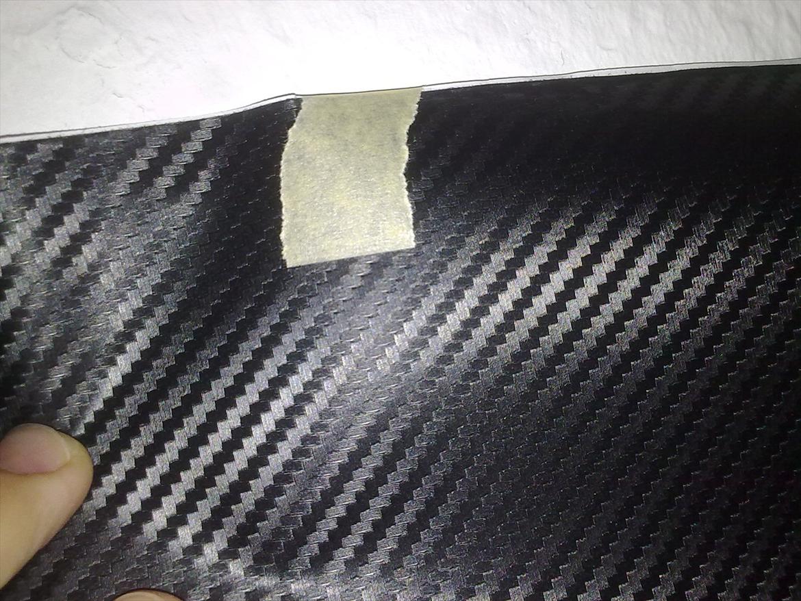 Carbon folie i Astra g - Første øjekast ser filmen fin ud nu det ikke er 3m billede 1