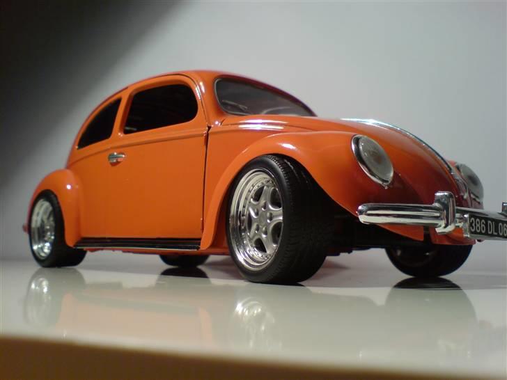 MODEL BILER i størrelse 1:43-1:24 og 1:18  - VW Beetle...

Str: 1:18


Har selv om bygget den med Porsche 911 GT3 fælge med GT3 bremse skiver samt GT3 sæder og sorte bag og sideruder. billede 1