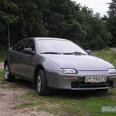 Mazda 323 F  Solgt.....