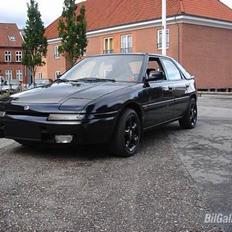 Mazda 323f "knight Rider" solgt