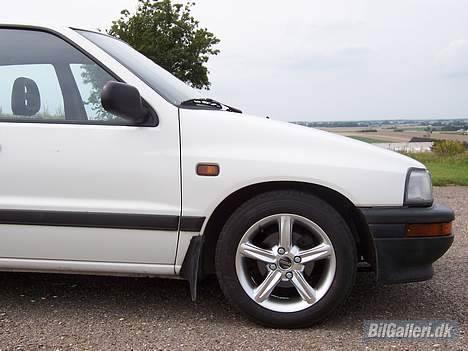 Daihatsu Charade CX 1.3i *SOLGT* billede 7