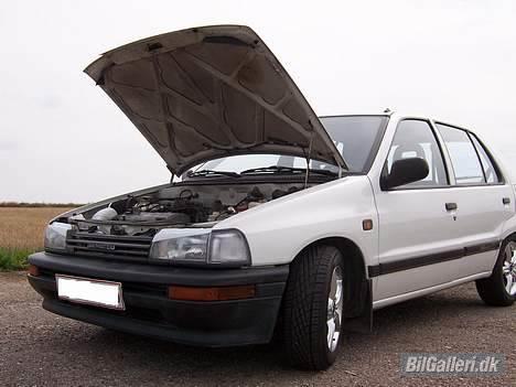 Daihatsu Charade CX 1.3i *SOLGT* billede 9