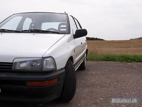 Daihatsu Charade CX 1.3i *SOLGT* billede 10