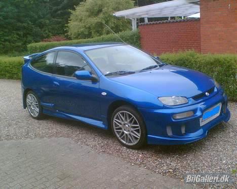 Mazda 323c Solgt - wooow billede 1