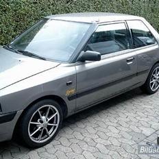 Mazda 323 bg