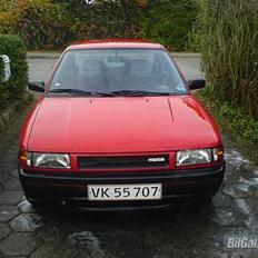 Mazda 323 SedanLX"Brændt af"