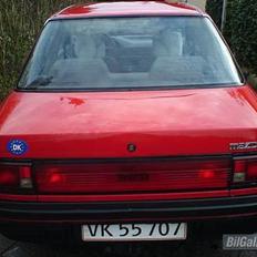 Mazda 323 SedanLX"Brændt af"