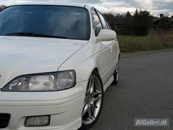 {{currentPhoto.altText}} billede {{currentPhoto.number}}