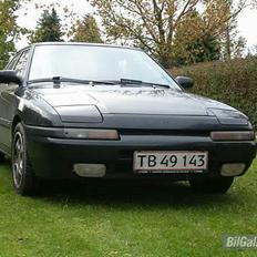 Mazda 323 f solgt