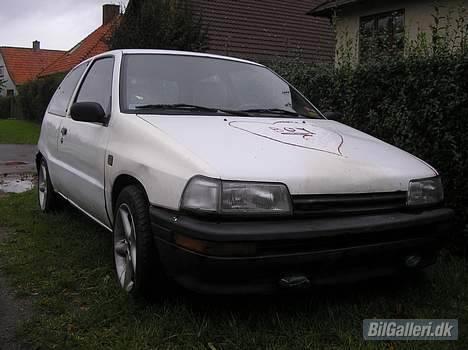 Daihatsu Charade "solgt" - Ja, køn er den ikke, men der sidder gode stumper her og der. billede 7