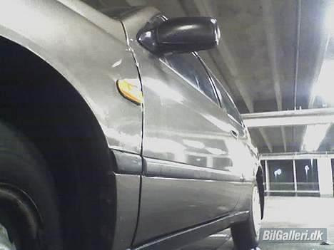 Nissan Sunny N14 (SOLGT) - siden af bilen billede 3