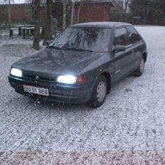 Mazda 323 sportline solgt