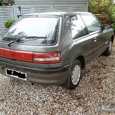 Mazda 323 sportline solgt