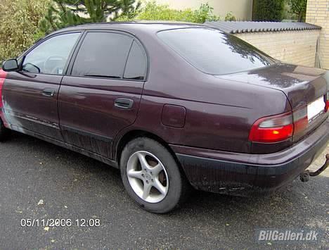 Toyota Carina E *SOLGT* - Den trænger nu til nye alu... billede 2