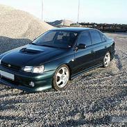 Toyota Carina E 1,6 16v Solgt