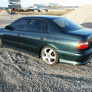 Toyota Carina E 1,6 16v Solgt