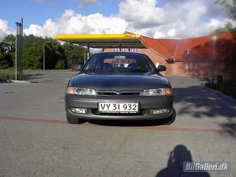 Mazda 626 GLX - Taget foran UNO X og REMA 1000......nice ik billede 1