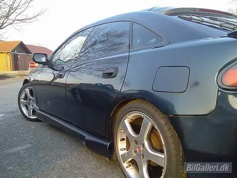 Mazda 323F *TOTALSKADET* billede 12