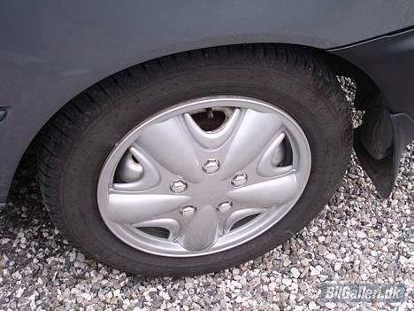 Toyota Corolla - lækre sutter.. der er ikke en trusse tør :P - den kalder på 17´´ billede 7