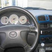 Mazda 323F bj glx.solgt