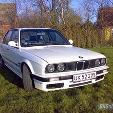 BMW 320i solgt