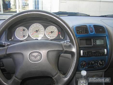 Mazda 323F bj glx.solgt billede 4
