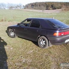 Mazda 323 f Vision solgt