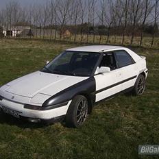 Mazda 323f Bg Solgt