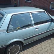 Toyota            Corolla 1,3 DX