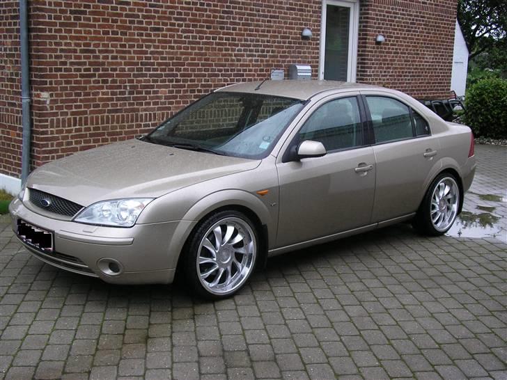 Ford mondeo 2,5 v6 ghia - sænket 40mm, og efter indrarvning af lister og kofangere billede 1