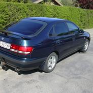 Toyota .-.Carina E Solgt.-.
