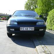 Toyota .-.Carina E Solgt.-.