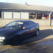 Mazda 323f  SOLGT