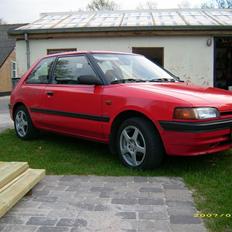Mazda 323 lx solgt