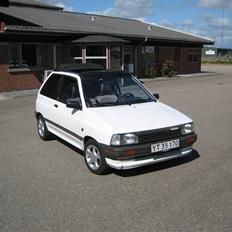 Mazda 121 Canvas top LX