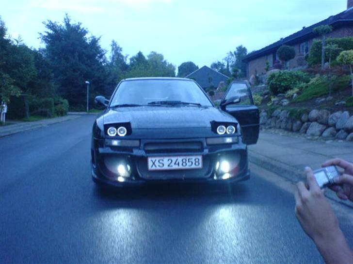 Mazda 323f SOLGT billede 1