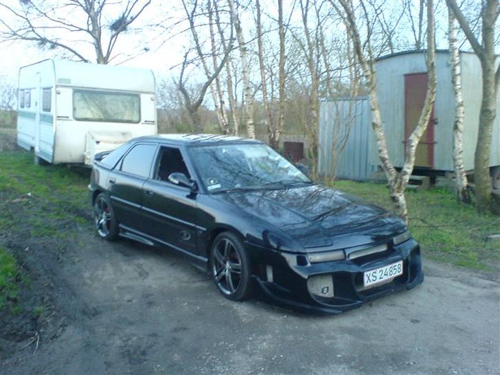 Mazda 323f SOLGT billede 4