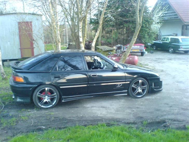 Mazda 323f SOLGT billede 6