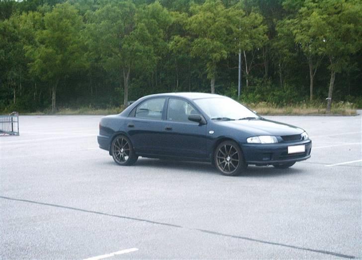 Mazda 323 BA Sedan Solgt billede 15