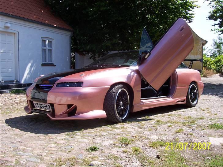 Opel Calibra SOLGT - LSD giver misundelige blikke nede på tanken.... billede 2