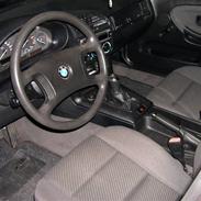 BMW 318i solgt