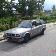 BMW 320i touring solgt