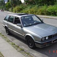 BMW 320i touring solgt