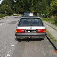 BMW 320i touring solgt