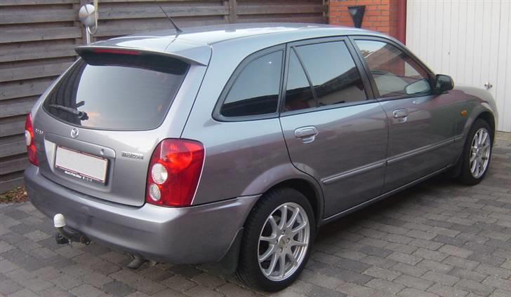 Mazda 323F BJ - Efter solfilm er monteret, 20% lysgennemgang i sideruder. billede 6