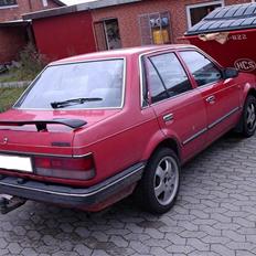 Mazda 323 1,3 Bf m. karb  SOLGT
